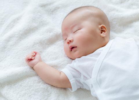 Newborn sleep with sales hat